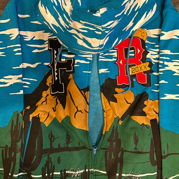 FIRST ROW GRAPHIC ZIP UP - Picture 1 of 2